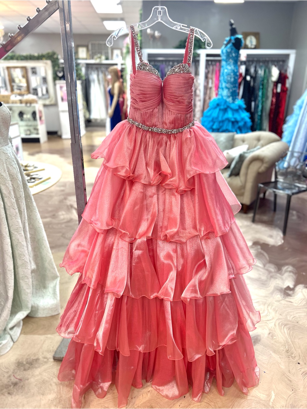 Strapless Coral Pink Tiered Ruffle Prom Gown With Beaded Accents